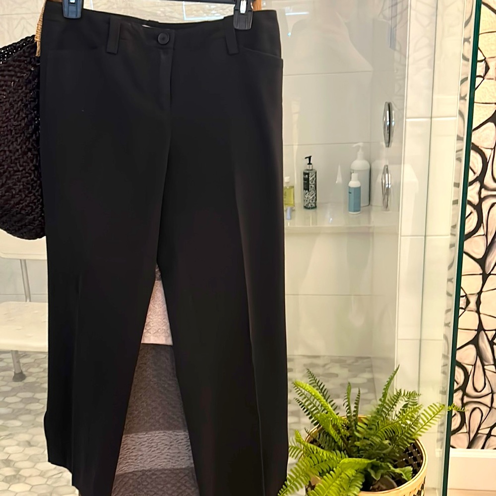 Cabi Black capri pants. Size 2. Minimal wear- good condition. Slit of capri legs